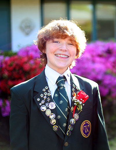 Home-Page-Upper-School- Middle school boy wearing a uniform