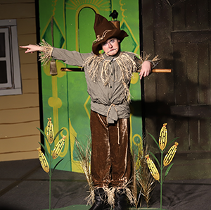Sixth Grade performs The Wizard of Oz on stage