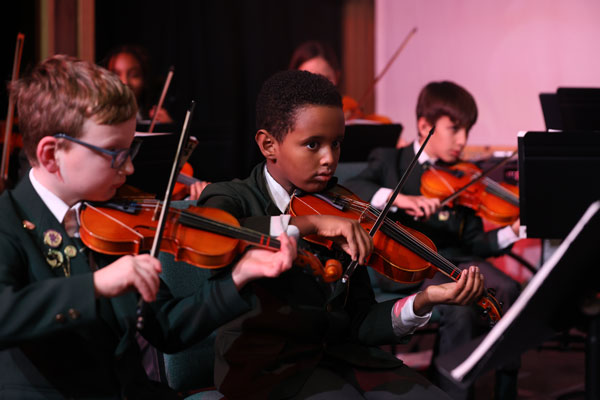 student playing violin