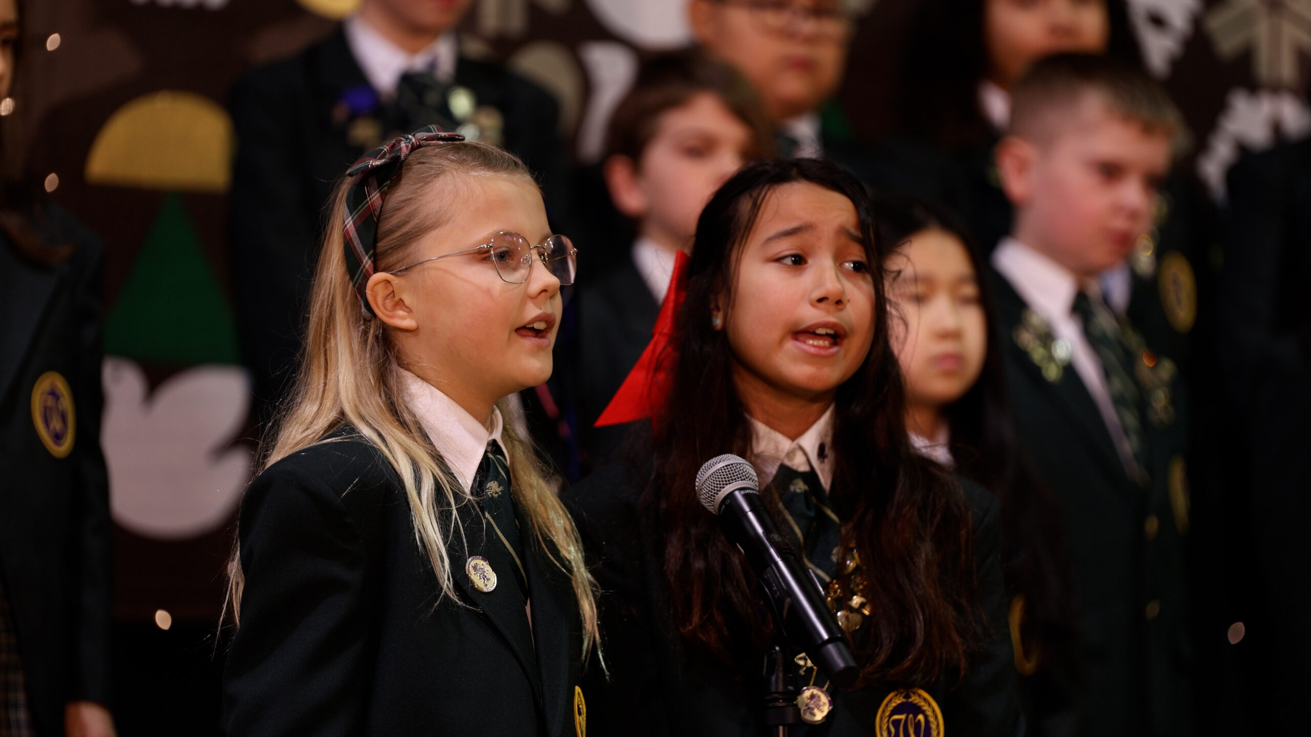Music Program students singing into microphone at Westminster School in Annandale, VA